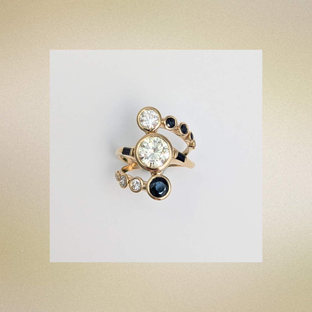 Custom heirloom diamond and sapphire ring in yellow gold